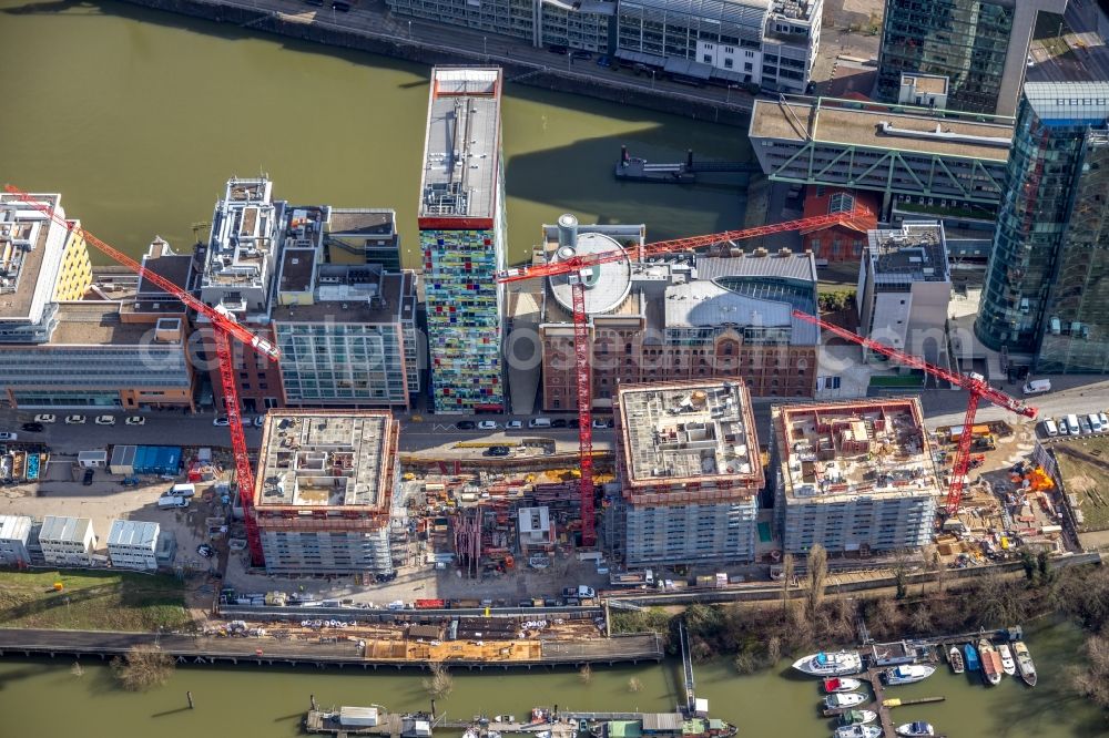 Aerial photograph Düsseldorf - Construction site for new high-rise building complex Duesseldorfer Heimathafen in of Speditionstrasse in Duesseldorf in the state North Rhine-Westphalia, Germany