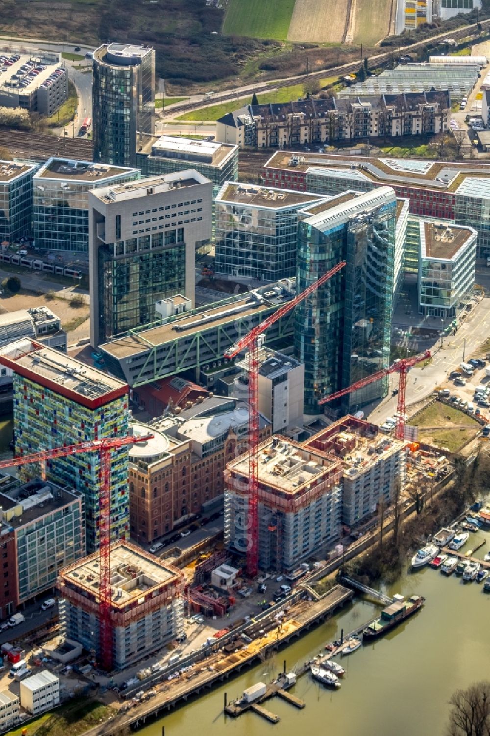 Düsseldorf from above - Construction site for new high-rise building complex Duesseldorfer Heimathafen in of Speditionstrasse in Duesseldorf in the state North Rhine-Westphalia, Germany