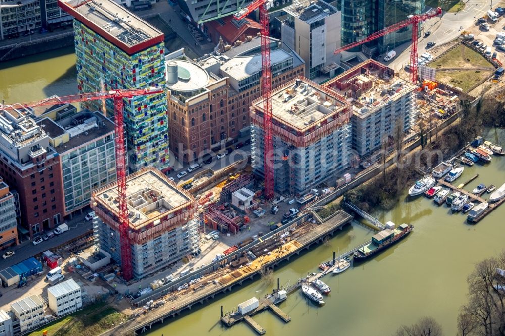 Aerial image Düsseldorf - Construction site for new high-rise building complex Duesseldorfer Heimathafen in of Speditionstrasse in Duesseldorf in the state North Rhine-Westphalia, Germany