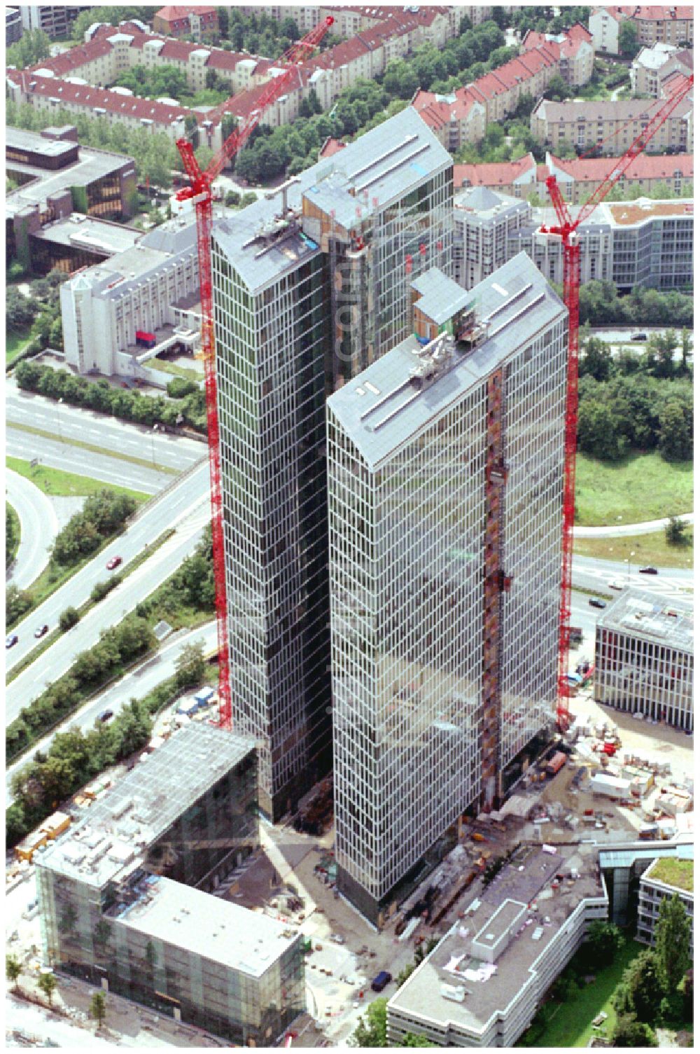 München from the bird's eye view: Construction site for new high-rise building complex HighLight Towers on corner Mies-van-der-Rohe- und Walter-Gropius-Strasse in the district Schwabing-Freimann in Munich in the state Bavaria, Germany