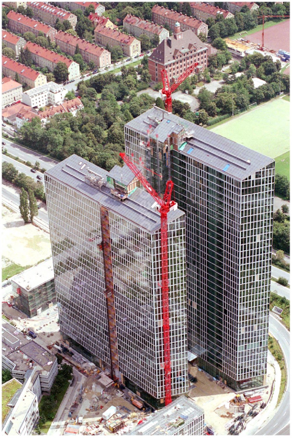 München from the bird's eye view: Construction site for new high-rise building complex HighLight Towers on corner Mies-van-der-Rohe- und Walter-Gropius-Strasse in the district Schwabing-Freimann in Munich in the state Bavaria, Germany