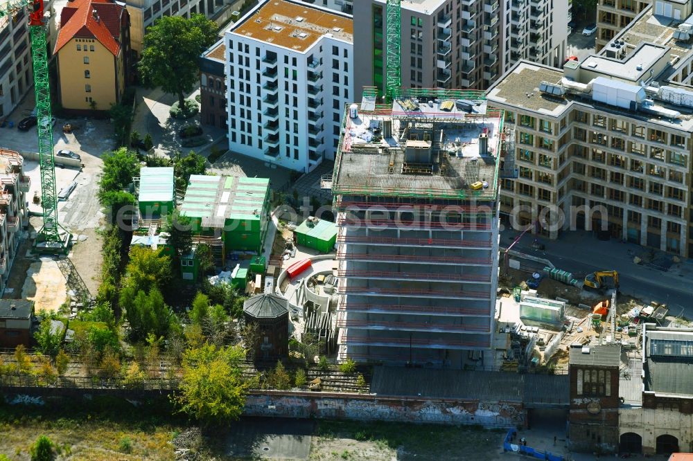 Aerial photograph Berlin - Construction site for new high-rise building complex Hochhaus on Postbahnhof in the district Friedrichshain in Berlin, Germany