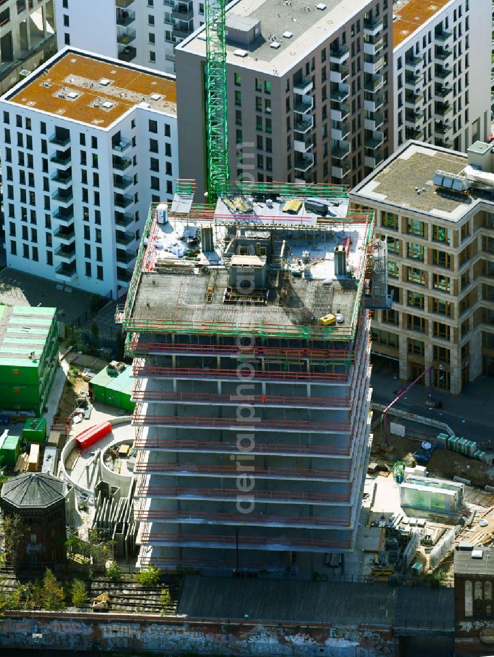 Berlin from the bird's eye view: Construction site for new high-rise building complex Hochhaus on Postbahnhof in the district Friedrichshain in Berlin, Germany