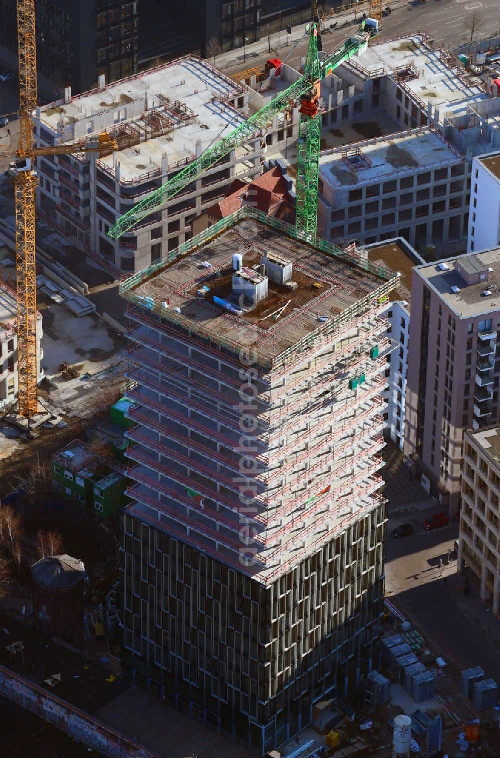 Aerial photograph Berlin - Construction site for new high-rise building complex Hochhaus on Postbahnhof in the district Friedrichshain in Berlin, Germany