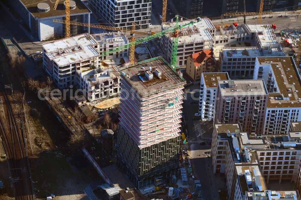 Berlin from the bird's eye view: Construction site for new high-rise building complex Hochhaus on Postbahnhof in the district Friedrichshain in Berlin, Germany