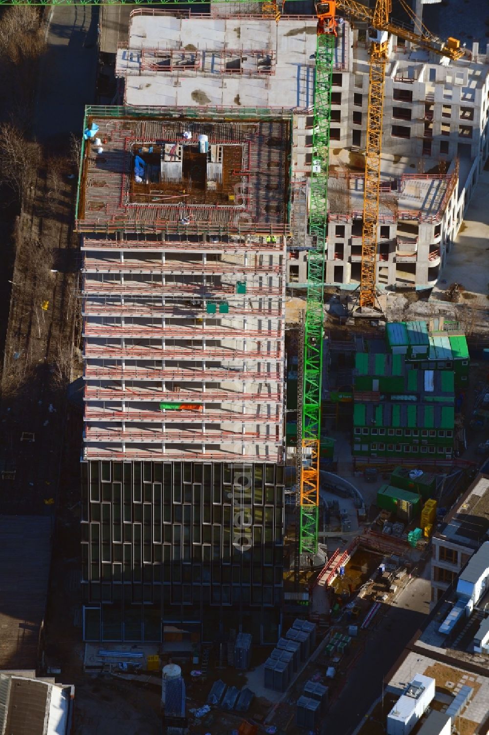 Berlin from the bird's eye view: Construction site for new high-rise building complex Hochhaus on Postbahnhof in the district Friedrichshain in Berlin, Germany