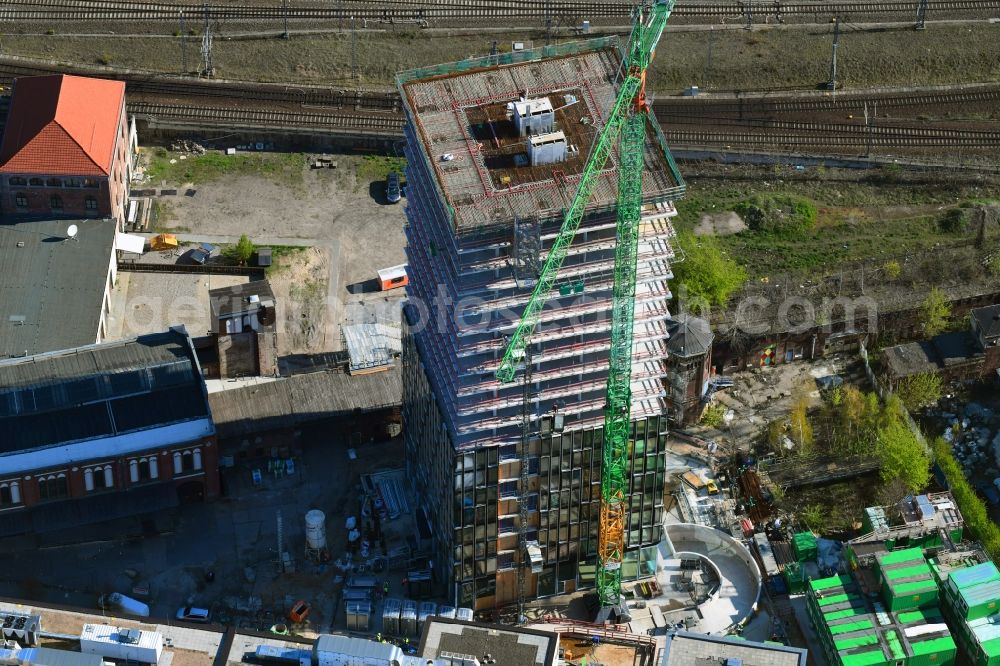 Aerial photograph Berlin - Construction site for new high-rise building complex Hochhaus on Postbahnhof in the district Friedrichshain in Berlin, Germany