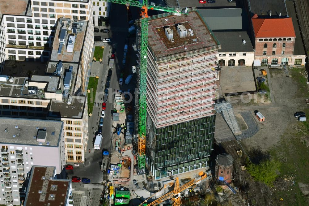 Berlin from the bird's eye view: Construction site for new high-rise building complex Hochhaus on Postbahnhof in the district Friedrichshain in Berlin, Germany