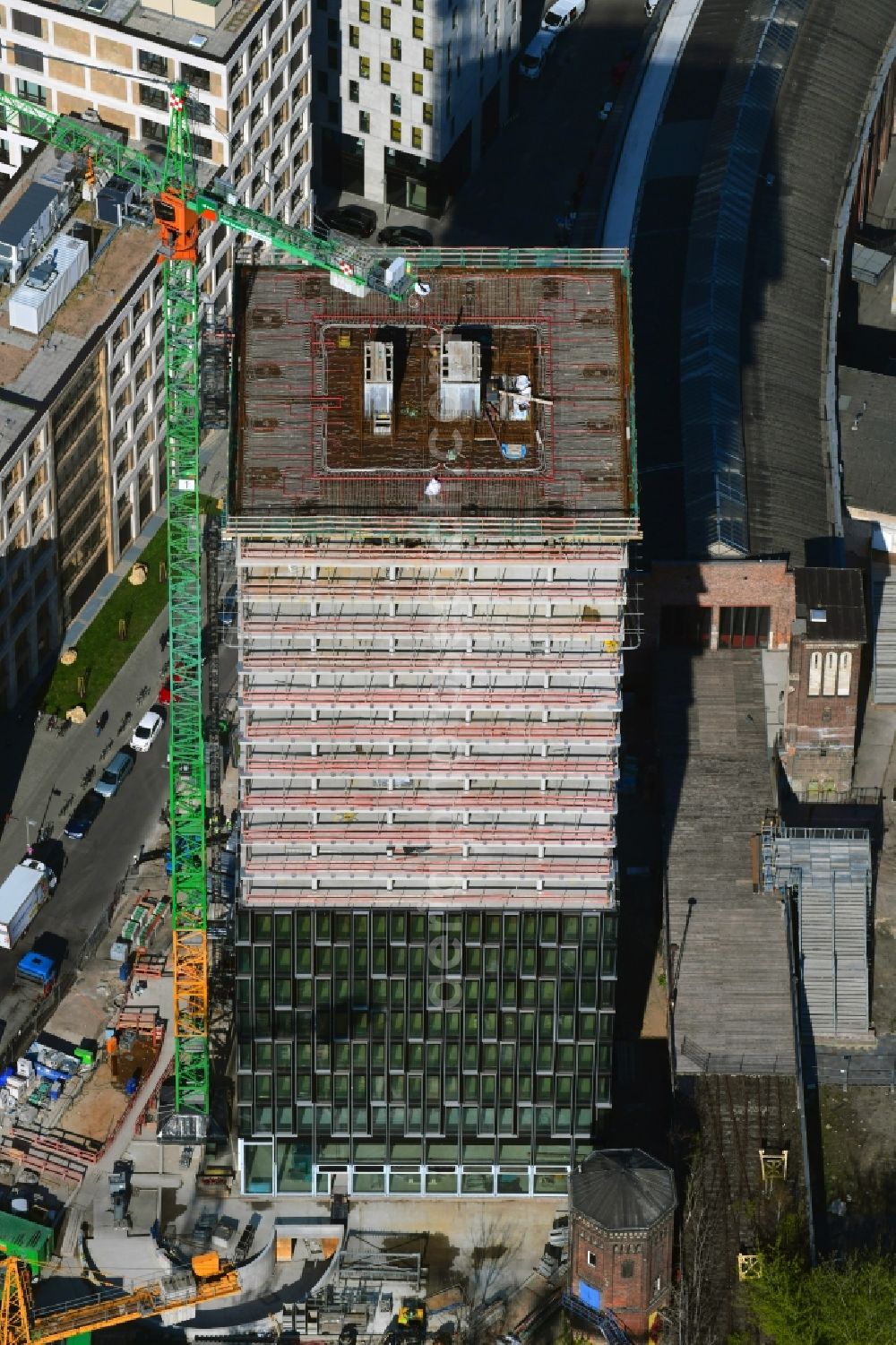 Berlin from the bird's eye view: Construction site for new high-rise building complex Hochhaus on Postbahnhof in the district Friedrichshain in Berlin, Germany