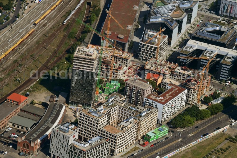 Berlin from the bird's eye view: Construction site for new high-rise building complex Hochhaus on Postbahnhof in the district Friedrichshain in Berlin, Germany