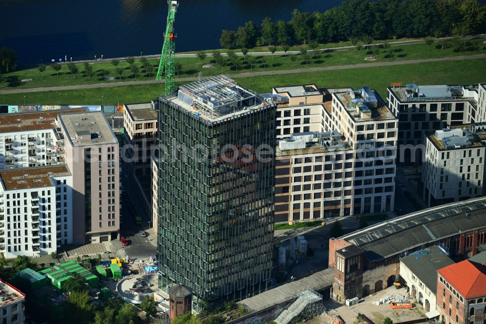 Berlin from the bird's eye view: Construction site for new high-rise building complex Hochhaus on Postbahnhof in the district Friedrichshain in Berlin, Germany