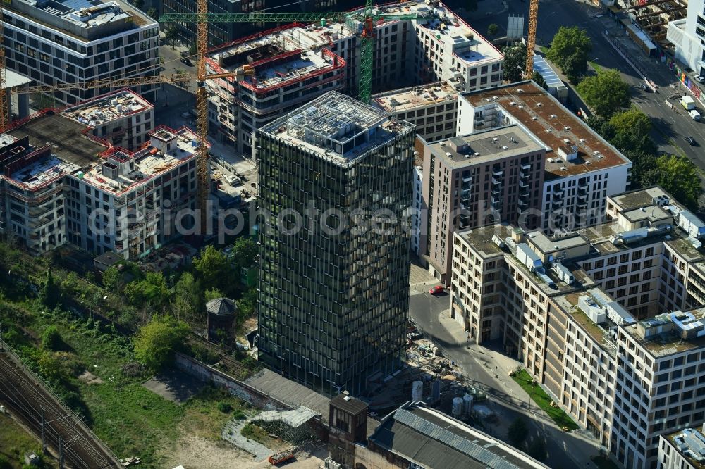 Berlin from the bird's eye view: Construction site for new high-rise building complex Hochhaus on Postbahnhof in the district Friedrichshain in Berlin, Germany