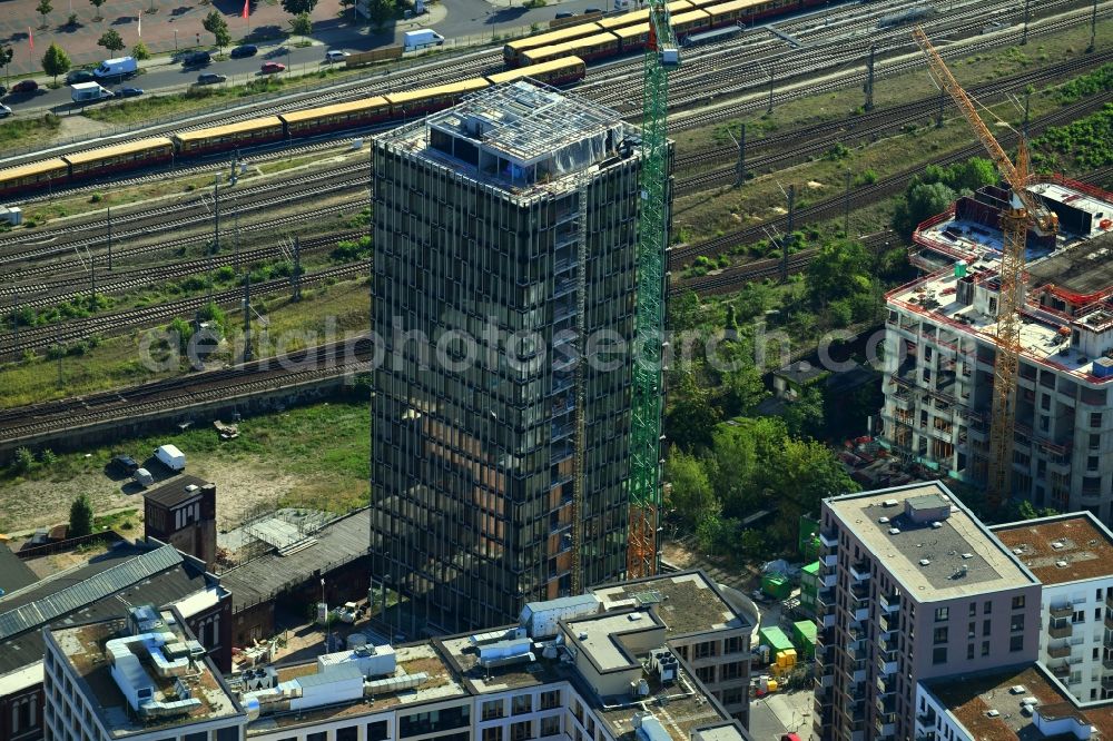 Aerial image Berlin - Construction site for new high-rise building complex Hochhaus on Postbahnhof in the district Friedrichshain in Berlin, Germany