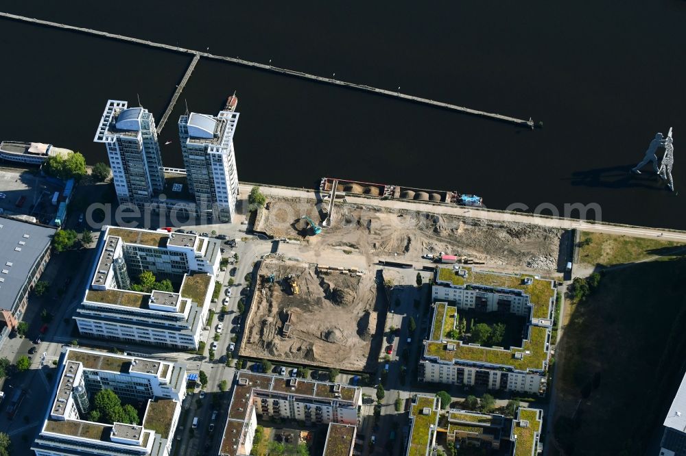 Berlin from above - Construction site for new high-rise building complex on river site of Spree along the Fanny-Zobel-Strasse in the district Treptow in Berlin, Germany