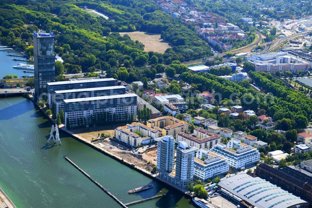 Berlin from the bird's eye view: Construction site for new high-rise building complex on river site of Spree along the Fanny-Zobel-Strasse in the district Treptow in Berlin, Germany