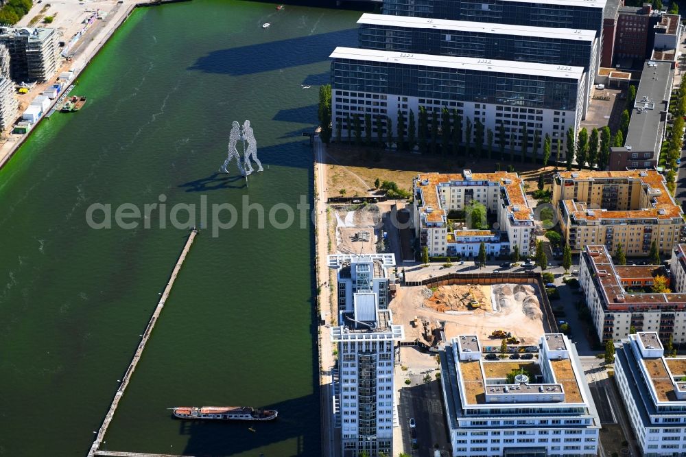 Aerial image Berlin - Construction site for new high-rise building complex on river site of Spree along the Fanny-Zobel-Strasse in the district Treptow in Berlin, Germany