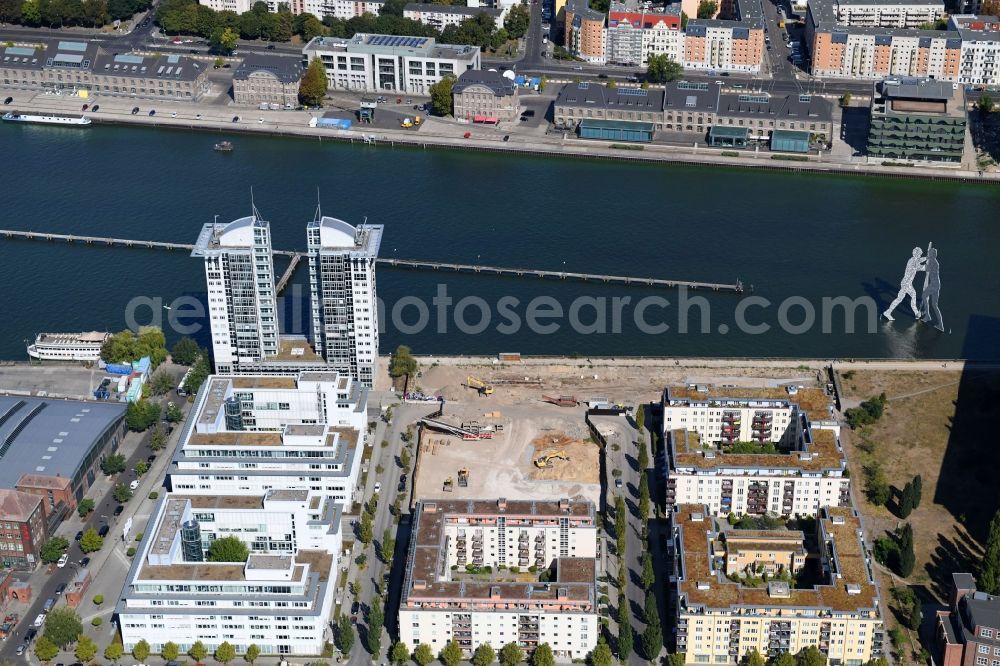 Berlin from above - Construction site for new high-rise building complex on river site of Spree along the Fanny-Zobel-Strasse in the district Treptow in Berlin, Germany