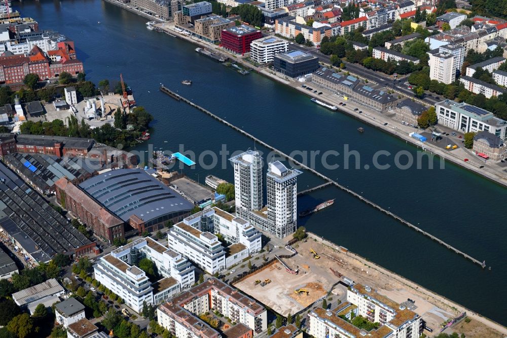 Aerial image Berlin - Construction site for new high-rise building complex on river site of Spree along the Fanny-Zobel-Strasse in the district Treptow in Berlin, Germany