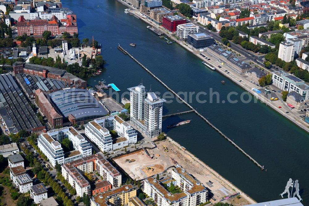 Aerial photograph Berlin - Construction site for new high-rise building complex on river site of Spree along the Fanny-Zobel-Strasse in the district Treptow in Berlin, Germany