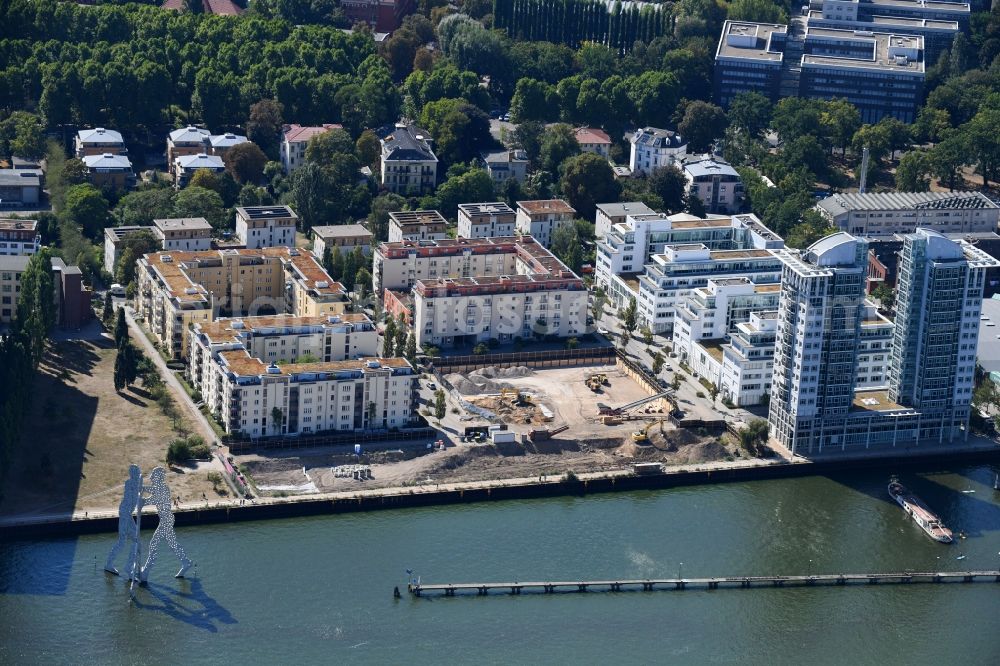 Berlin from above - Construction site for new high-rise building complex on river site of Spree along the Fanny-Zobel-Strasse in the district Treptow in Berlin, Germany