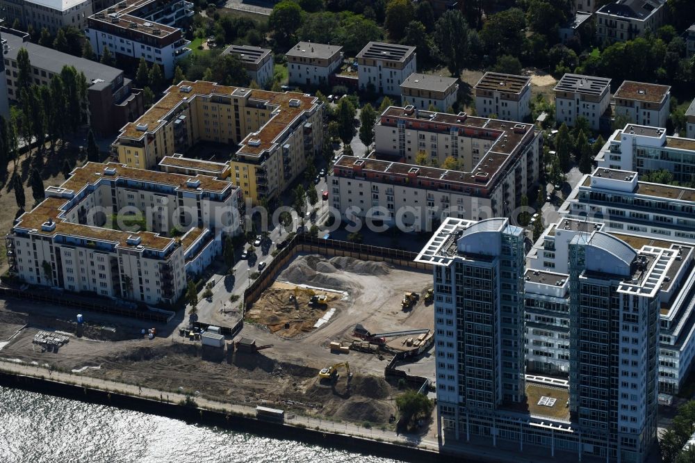 Aerial image Berlin - Construction site for new high-rise building complex on river site of Spree along the Fanny-Zobel-Strasse in the district Treptow in Berlin, Germany