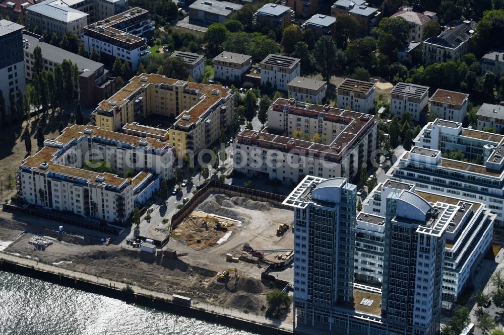 Aerial photograph Berlin - Construction site for new high-rise building complex on river site of Spree along the Fanny-Zobel-Strasse in the district Treptow in Berlin, Germany