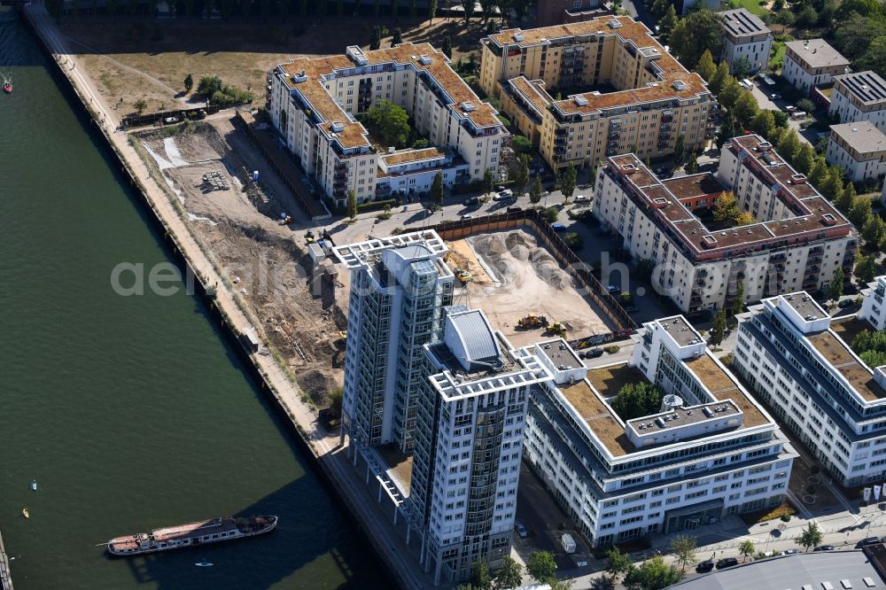 Berlin from above - Construction site for new high-rise building complex on river site of Spree along the Fanny-Zobel-Strasse in the district Treptow in Berlin, Germany