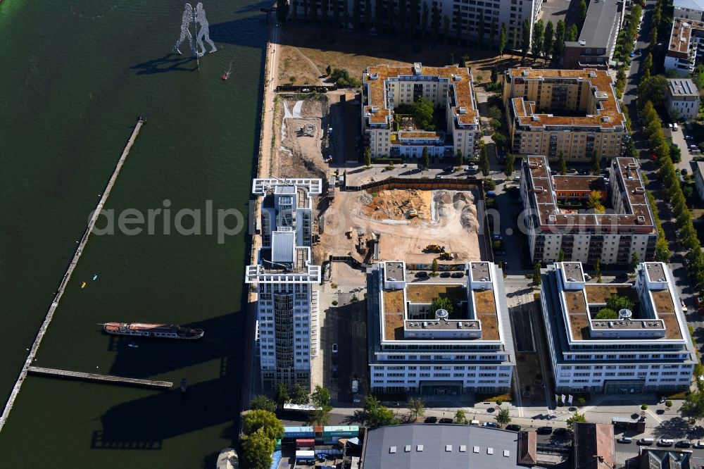 Aerial image Berlin - Construction site for new high-rise building complex on river site of Spree along the Fanny-Zobel-Strasse in the district Treptow in Berlin, Germany