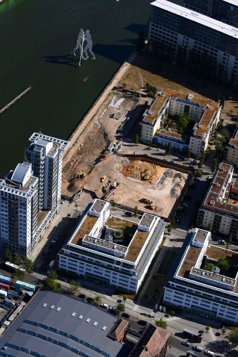 Berlin from above - Construction site for new high-rise building complex on river site of Spree along the Fanny-Zobel-Strasse in the district Treptow in Berlin, Germany