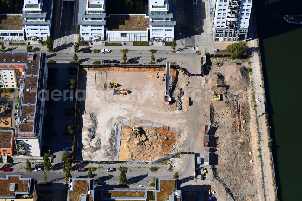 Aerial image Berlin - Construction site for new high-rise building complex on river site of Spree along the Fanny-Zobel-Strasse in the district Treptow in Berlin, Germany