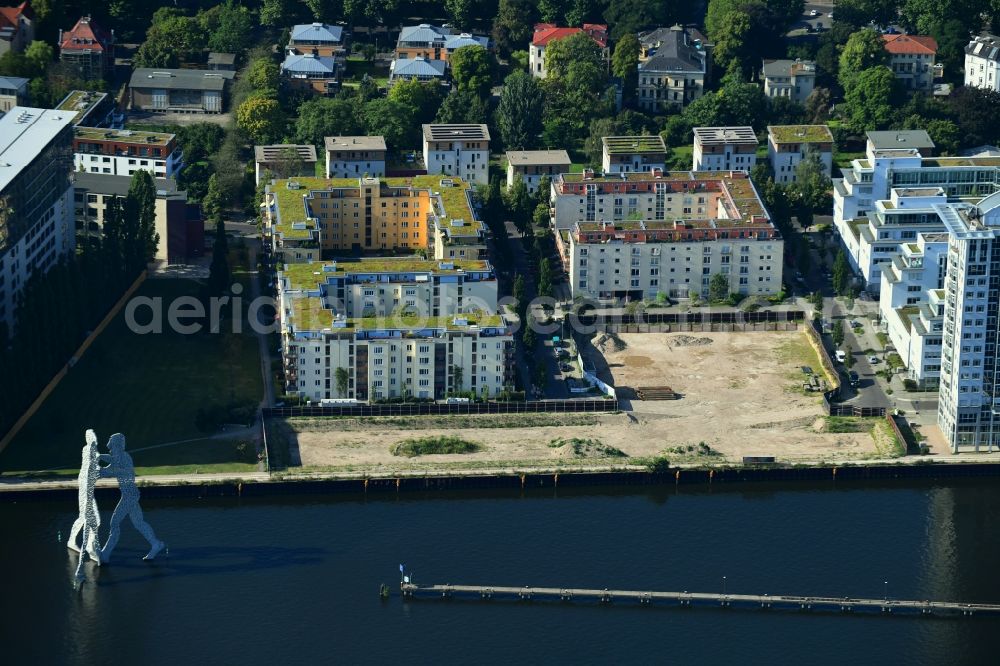 Aerial image Berlin - Construction site for new high-rise building complex on river site of Spree along the Fanny-Zobel-Strasse in the district Treptow in Berlin, Germany