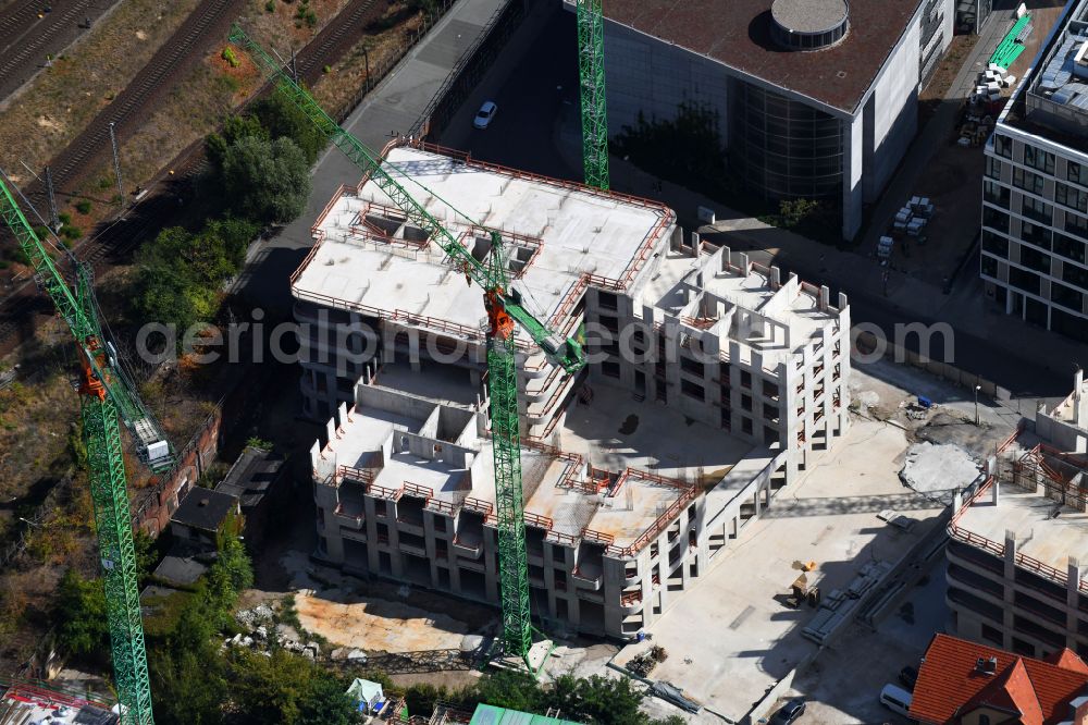 Berlin from above - Construction site for the new skyscraper ensemble Max und Moritz Quartier - UPSIDE BERLIN with residential and commercial units by the company DIE WOHNKOMPANIE Berlin GmbH and the architecture office Noefer Gesellschaft von Architekten mbH on Mariane-von-Rantzau-Strasse in the district Friedrichshain in Berlin, Germany