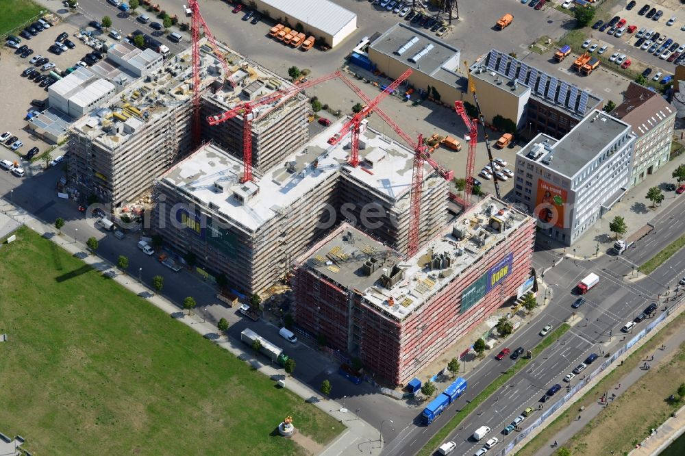 Aerial image Berlin - Construction site to build a new hotel and office campus on the Anschutz area in the district of Friedrichshain in Berlin. Porr Solutions Germany GmbH is the owner and developer of the property