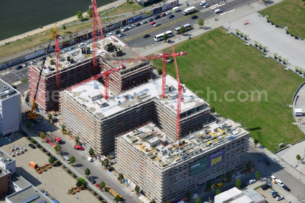 Berlin from the bird's eye view: Construction site to build a new hotel and office campus on the Anschutz area in the district of Friedrichshain in Berlin. Porr Solutions Germany GmbH is the owner and developer of the property