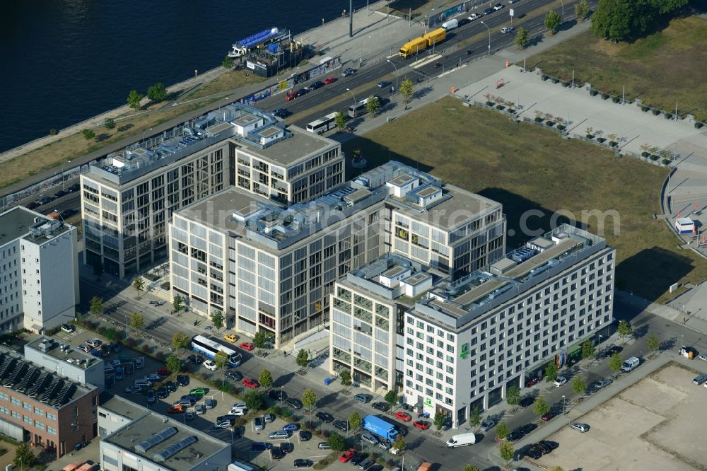 Berlin from the bird's eye view: Construction site to build a new hotel and office campus on the Anschutz area in the district of Friedrichshain in Berlin. Porr Solutions Germany GmbH is the owner and developer of the property