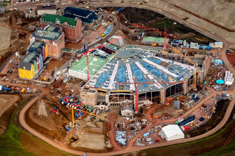 Rust from above - Construction for the new building of the spa and swimming pool at the swimming pool of Recreation Europa-Park in Rust in the state Baden-Wurttemberg