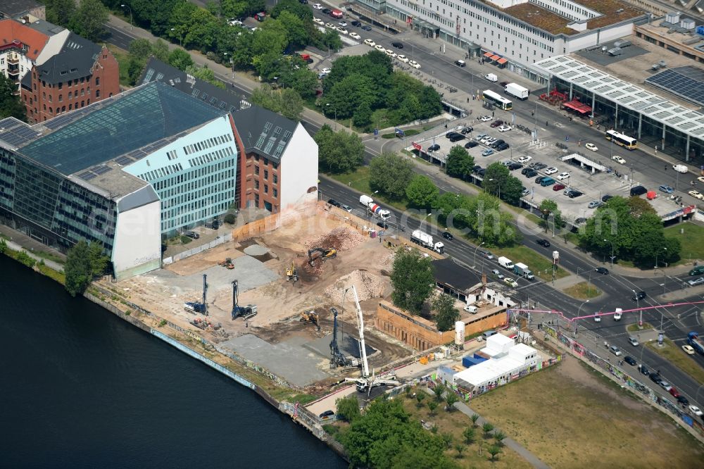 Berlin from above - Construction site to build a new hotel and a residential building by the construction company Schrobsdorff Bau AG at Stralauer Platz in district Friedrichshain in Berlin, Germany. Client is JUWI 3 Immobilien GmbH