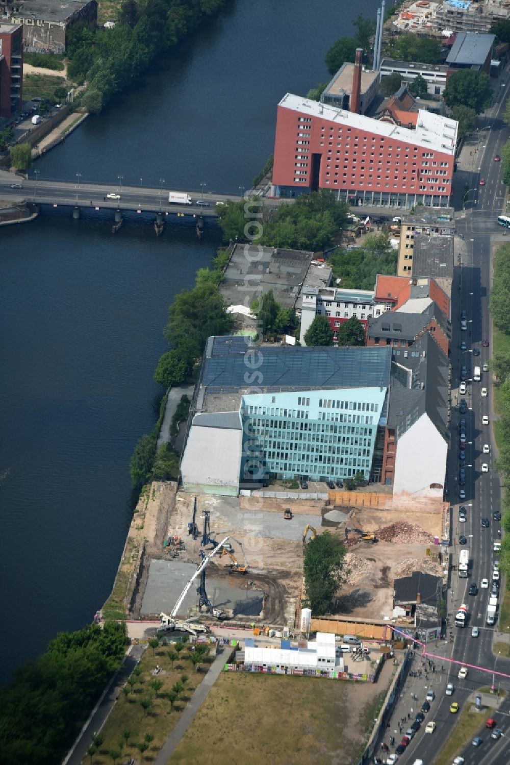 Aerial photograph Berlin - Construction site to build a new hotel and a residential building by the construction company Schrobsdorff Bau AG at Stralauer Platz in district Friedrichshain in Berlin, Germany. Client is JUWI 3 Immobilien GmbH