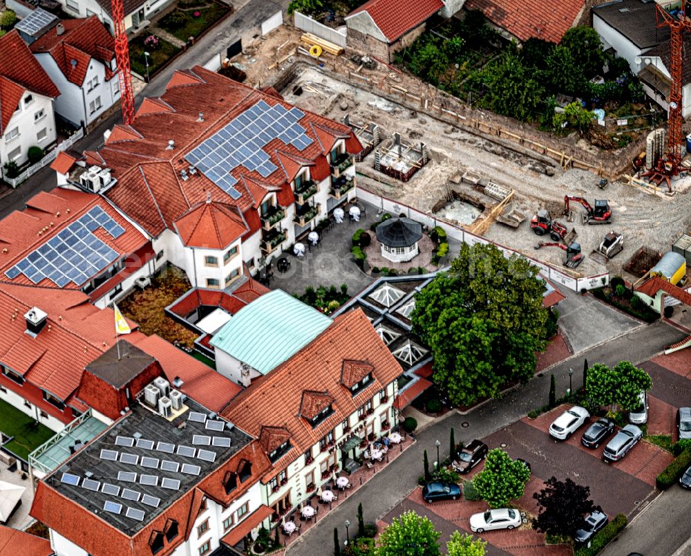 Rauenberg from the bird's eye view: New construction site the hotel complex Erweiterung of Winzerhofes in Rauenberg in the state Baden-Wurttemberg, Germany