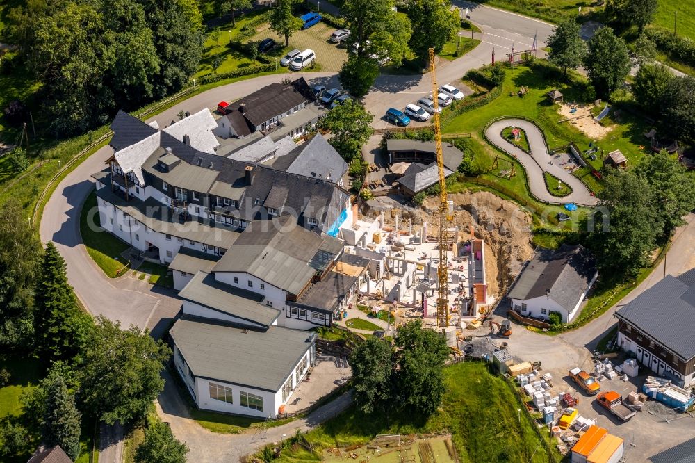 Schmallenberg from the bird's eye view: New construction site the hotel complex Familotel Ebbinghof in the district Ebbinghof in Schmallenberg in the state North Rhine-Westphalia, Germany