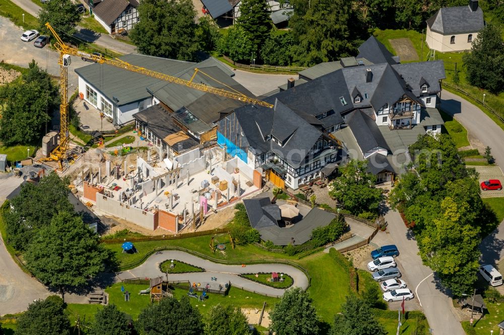 Schmallenberg from the bird's eye view: New construction site the hotel complex Familotel Ebbinghof in the district Ebbinghof in Schmallenberg in the state North Rhine-Westphalia, Germany