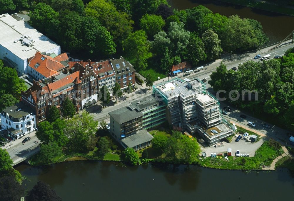 Lübeck from the bird's eye view: New construction site the hotel complex Hotel Am Muehlenteich in the district Innenstadt in Luebeck in the state Schleswig-Holstein, Germany