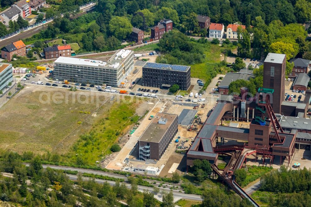 Essen from above - New construction site the hotel complex of the new opened hotel friends Zeche-Zollverein Essen overlooking the construction site of the office building at Martin-Kremmer-Strasse in Essen in the state North Rhine-Westphalia, Germany