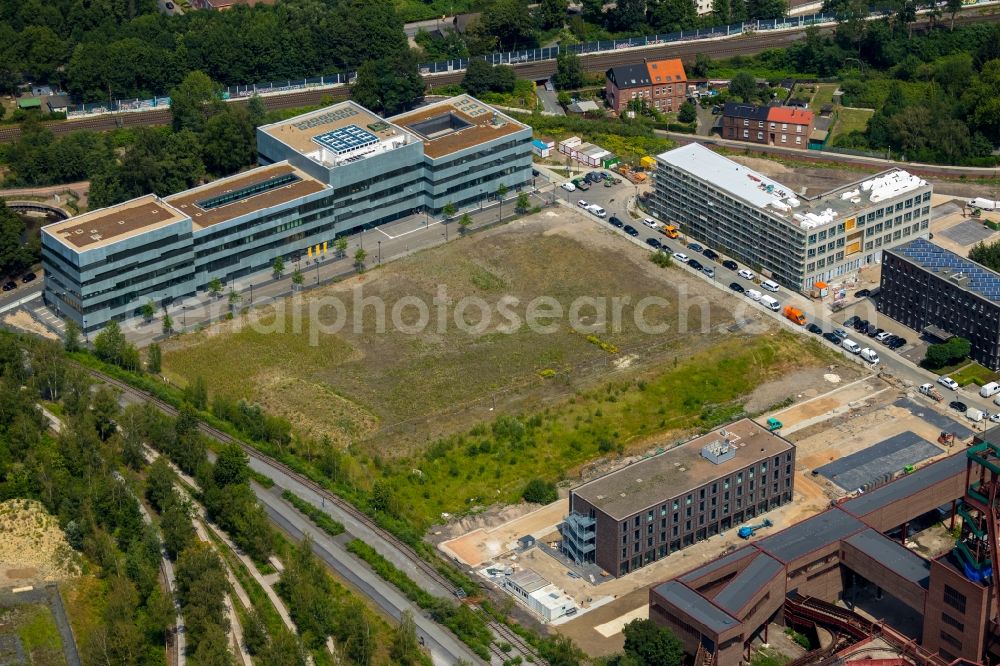 Aerial image Essen - New construction site the hotel complex of the new opened hotel friends Zeche-Zollverein Essen overlooking the construction site of the office building at Martin-Kremmer-Strasse in Essen in the state North Rhine-Westphalia, Germany