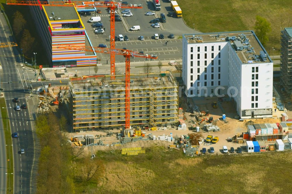 Aerial photograph Berlin - New construction site the hotel complex Alexander-Meissner-Strasse corner Am Seegraben in the district Bohnsdorf in Berlin, Germany