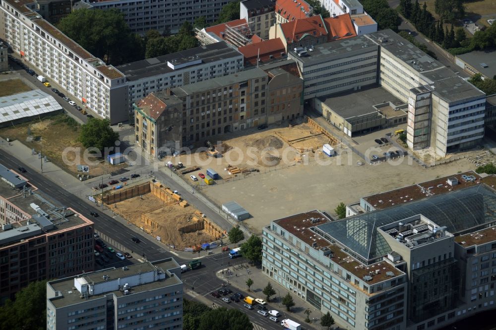 Berlin from the bird's eye view: Construction site for the new building of a hotel in the Mitte part of Berlin in Germany. The hotel is being developed on Petriplatz on the corner to Breite Strasse and is currently in the excavation phase