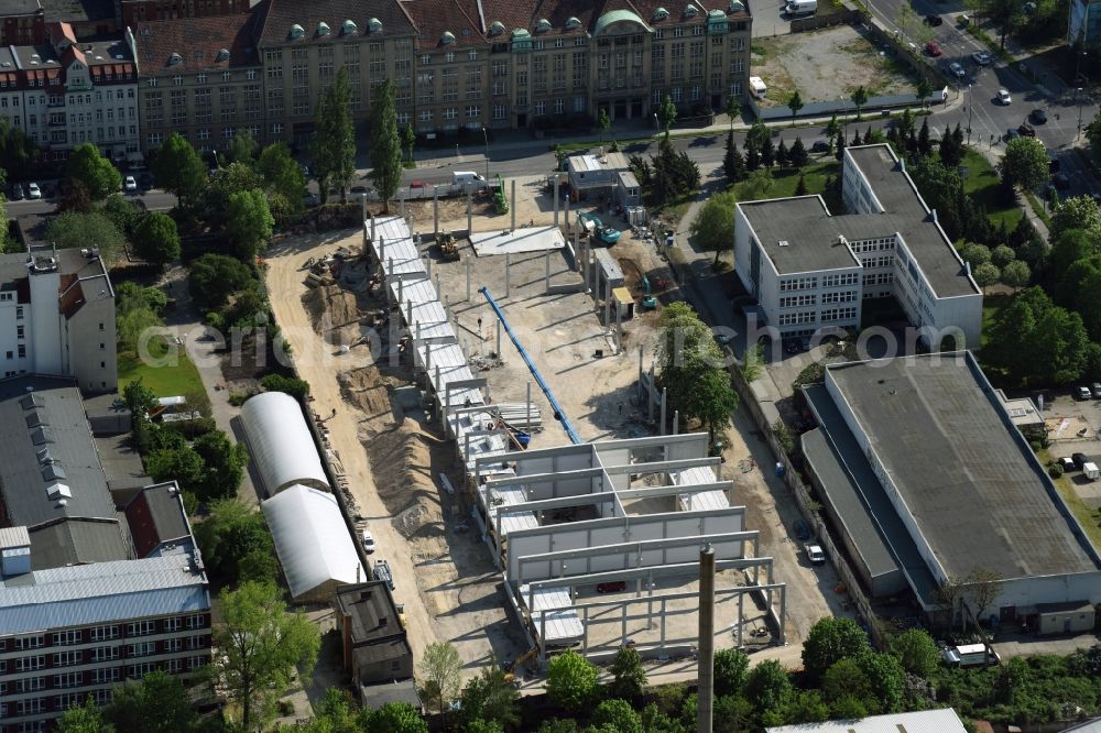 Berlin from above - Construction of a new industrial buildings and warehouse by the Wolff & Mueller GmbH & Co. KG at the Josef Orlopp street in Berlin