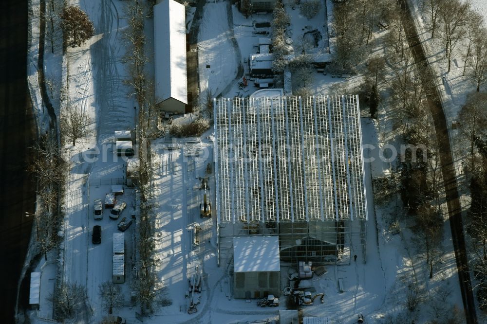 Berlin from above - Wintry snowy construction site to build a new information pavilion for the IGA 2017 in the Eisenacher Strasse in Marzahn district in Berlin