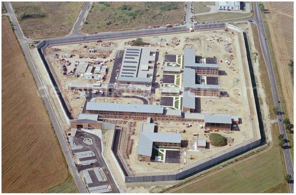 Duben from the bird's eye view: New construction site on the prison premises and security fencing of the prison Luckau-Duben in Duben in the state Brandenburg, Germany