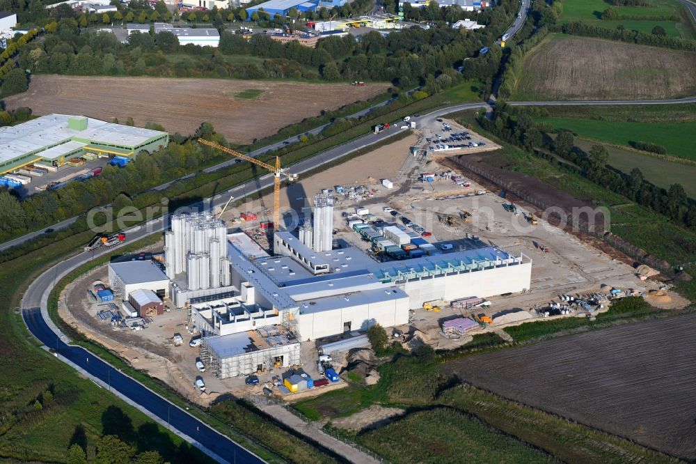 Aerial photograph Neumünster - Construction site for the new construction of a cheese factory of the Meierei Barmstedt eG at the Donaubogen in Neumuenster in the state of Schleswig-Holstein, Germany